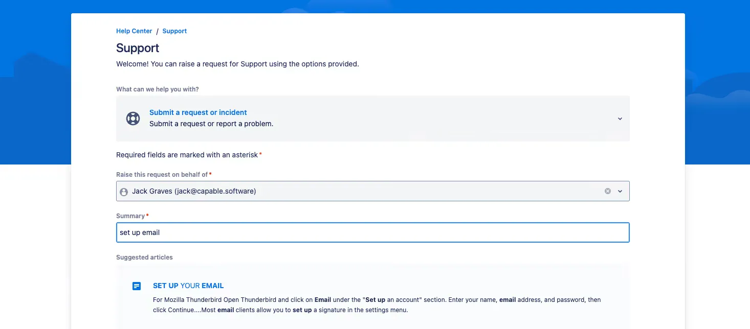 Jira Service Management help centre suggesting the published Set Up Your Email article while raising a request